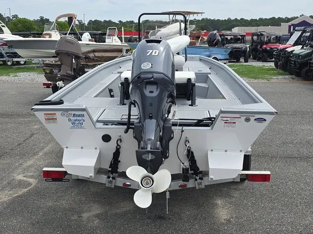 Slide: The Image of The image shows a 2026 G3 Bay 17 boat with an outboard motor on a trailer. - 9