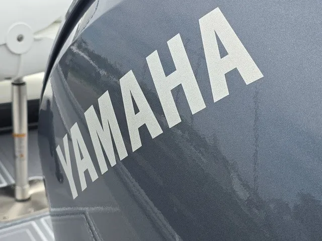 Slide: The Image of Close-up of a Yamaha engine on a G3 Bay 17 boat. - 11