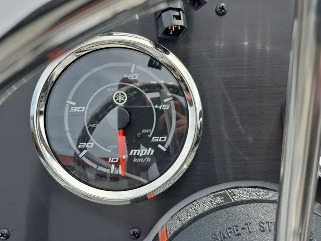 Slide: The Image of Close-up of a speedometer on a G3 Bay 17 boat, showing speeds in mph and km/h. - 28