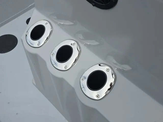 Slide: The Image of Three stainless steel rod holders are integrated into the boat's white surface. - 26