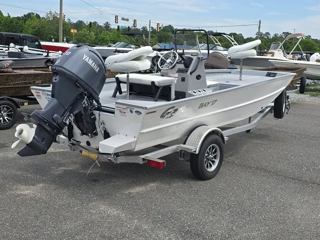 Slide: The Image of A 2026 G3 Bay 17 boat on a trailer. It features a Yamaha outboard motor. - 8