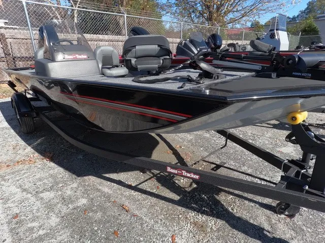 The Image of 2026 Tracker Bass Tracker Classic XL parked on a trailer in an outdoor setting. - 1