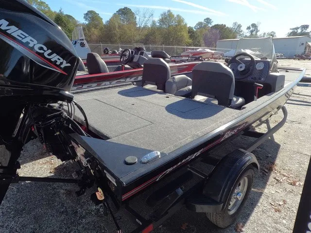 Slide: The Image of 2026 Tracker Bass Tracker Classic XL: Fishing boat with two seats and an outboard motor. - 10