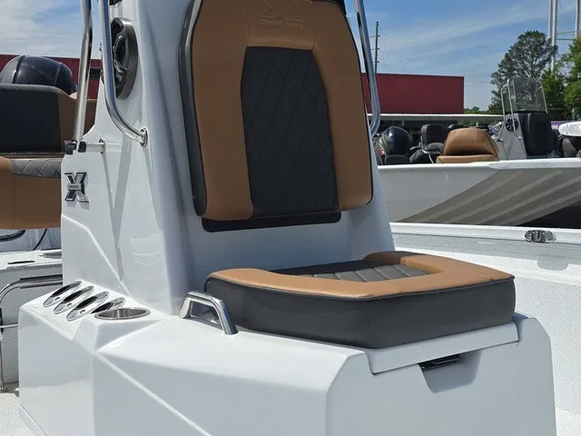 Slide: The Image of A modern boat with a cushioned seat and console. It features a sleek design. - 20