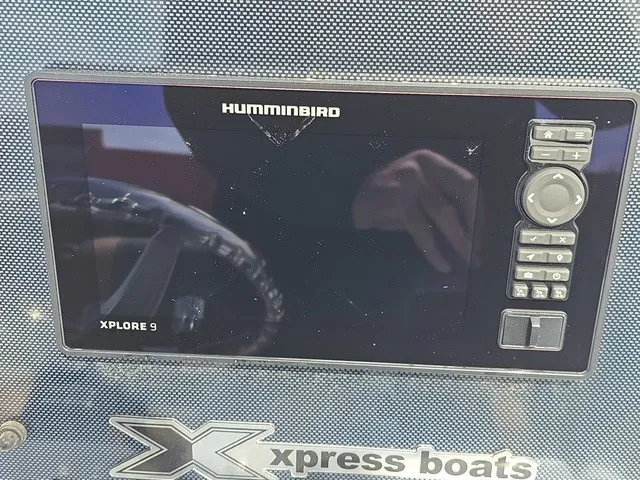 Slide: The Image of A Humminbird Xplore 9 navigation system is installed in an Xpress SW20B boat. - 27