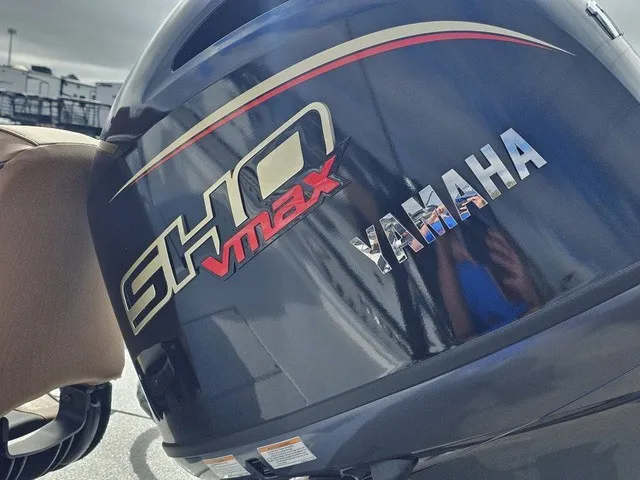 Slide: The Image of Close-up of a Yamaha SHO VMAX outboard motor mounted on a boat. - 31