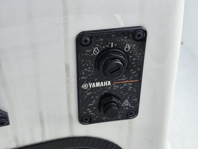 Slide: The Image of Close-up of a Yamaha switch on an Xpress XP20CC boat. - 28