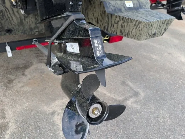 Slide: The Image of Close-up of a boat propeller with a sturdy design and black color. - 17