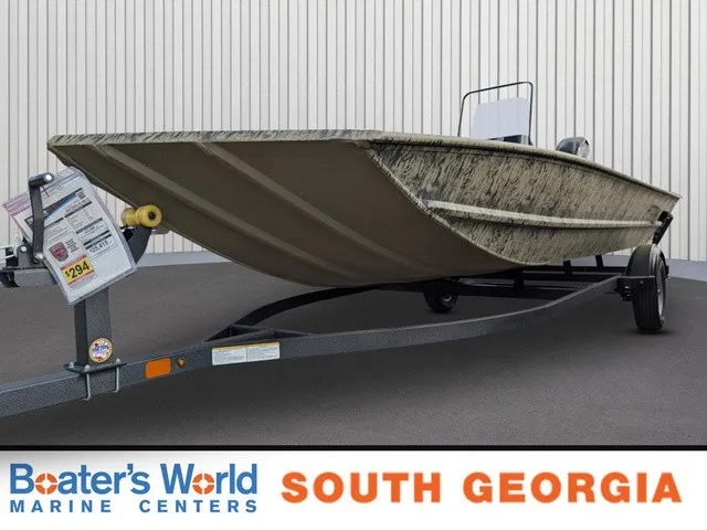 The Image of 2026 Tracker Grizzly 1860 CC on a trailer in a showroom. - 1