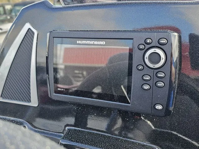 Slide: The Image of A Humminbird Helix fish finder is mounted on a boat. - 27