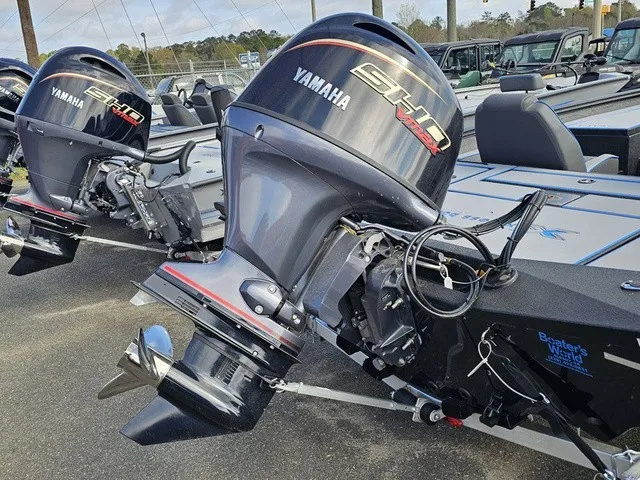 Slide: The Image of Two Yamaha outboard motors are mounted on an Xpress H18C Crappie boat, which is on a trailer. - 9