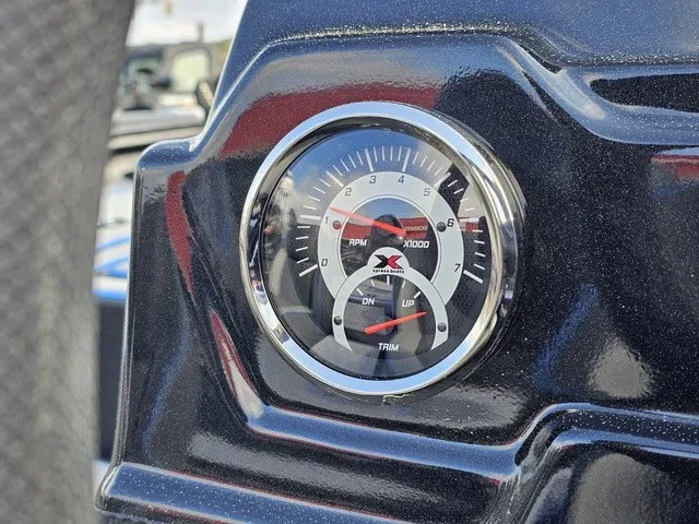 Slide: The Image of Close-up of a tachometer on a 2026 Xpress H18C Crappie boat. - 28