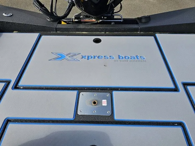 Slide: The Image of The image shows the deck of an Xpress H18C Crappie boat with the "Xpress Boats" logo. - 38