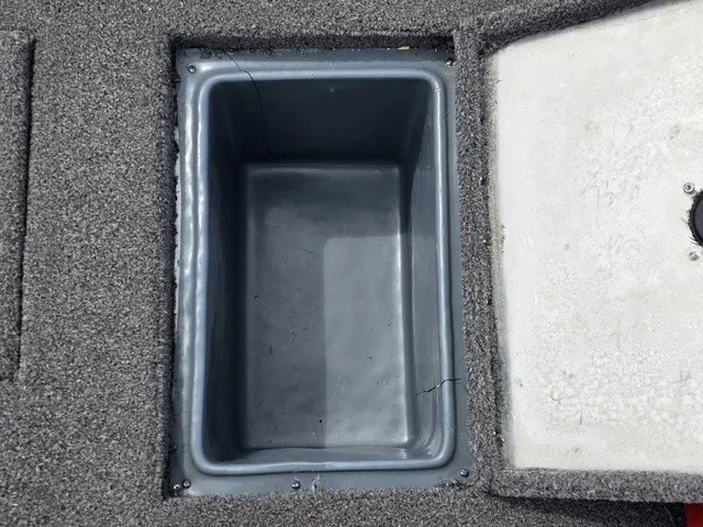 Slide: The Image of A gray, rectangular compartment is embedded in the boat's floor. - 14
