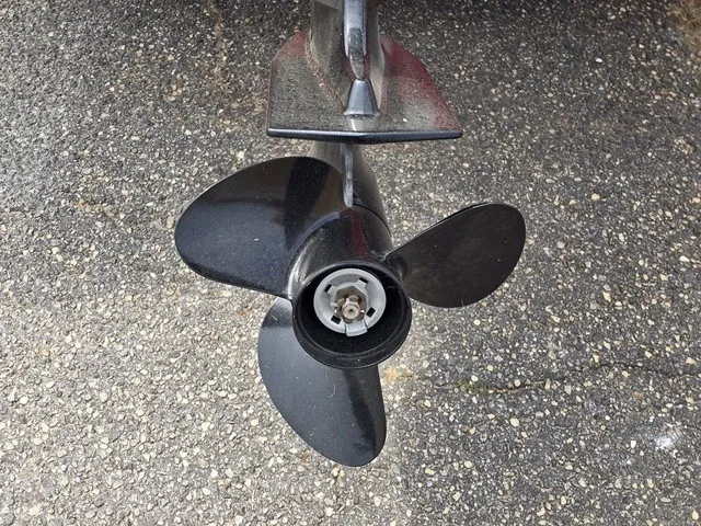 Slide: The Image of Close-up of a three-blade propeller on a gravel surface. - 30