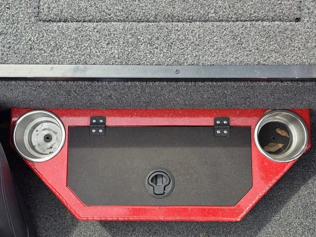 Slide: The Image of A red boat component with two cup holders and a black compartment lid. - 21