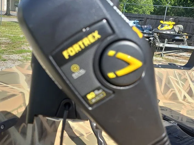Slide: The Image of Close-up of a boat part with a Fortrex logo and yellow controls. - 30