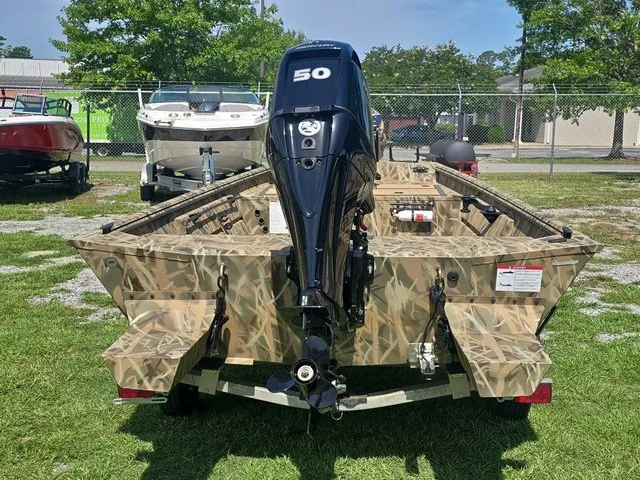 Slide: The Image of The image shows a 2025 Lowe RX1760 boat with a 50 HP motor, on a trailer. - 7