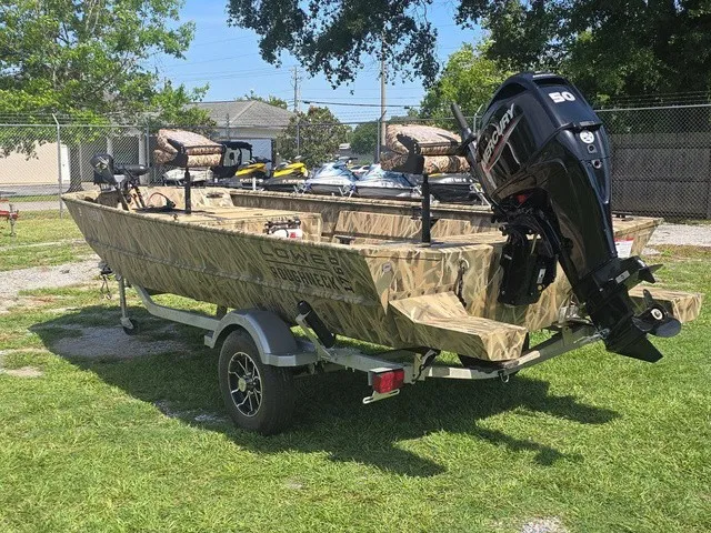 Slide: The Image of A 2025 Lowe RX1760 boat with a Mercury 50 HP outboard motor, on a trailer. - 8