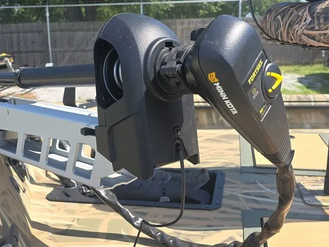 Slide: The Image of Close-up of a Minn Kota trolling motor on a Lowe RX1760 boat. - 11