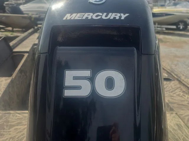Slide: The Image of A Mercury 50 HP outboard motor is mounted on a boat. - 19