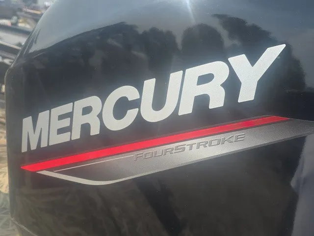 Slide: The Image of Close-up of a Mercury FourStroke engine mounted on a Lowe Skorpion SS boat. - 18