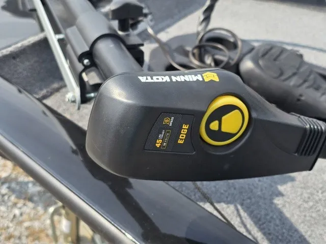 Slide: The Image of Close-up of a Minn Kota Edge trolling motor on a Tracker boat. - 19
