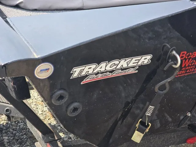 Slide: The Image of Close-up of a Tracker boat's stern with logo and trailer hitch. - 12