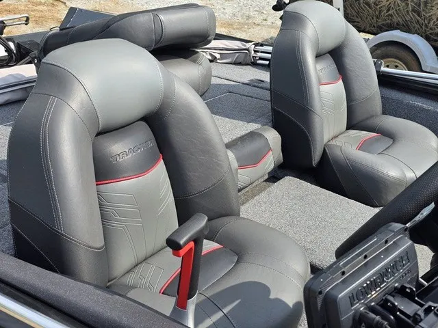Slide: The Image of The image shows the gray leather seats of a 2020 Tracker Pro Team 175 TXW boat. - 24