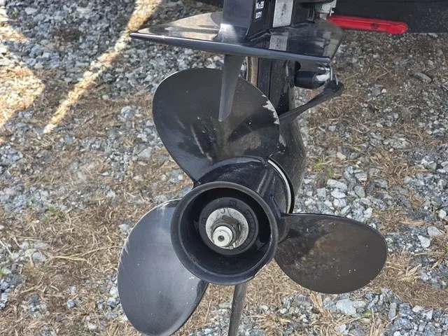 Slide: The Image of Close-up of a three-blade propeller on a gravel surface. - 10