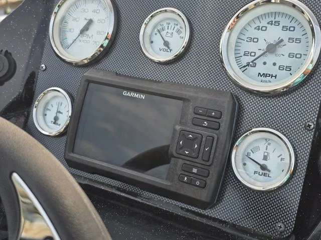 Slide: The Image of Dashboard of a 2020 Caravelle RAPTOR with Garmin navigation system and various gauges. - 26