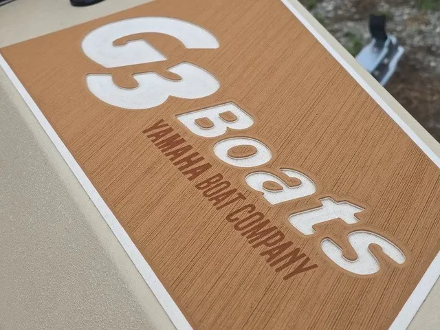 Slide: The Image of Close-up of the G3 Boats logo on a boat. - 28
