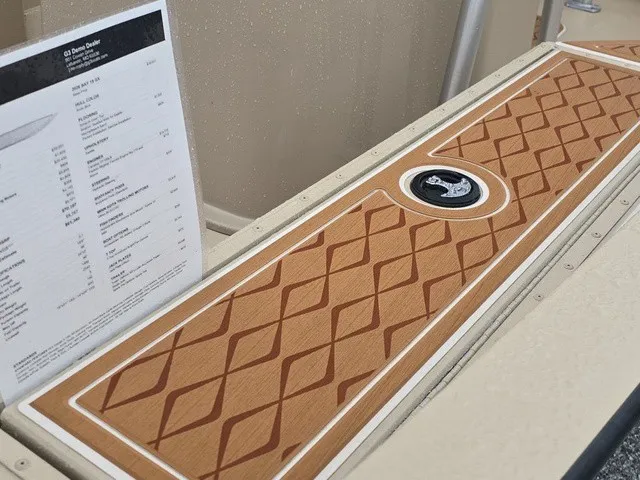 Slide: The Image of The 2026 G3 Bay 19 GX features a sleek deck with a diamond pattern design. - 9