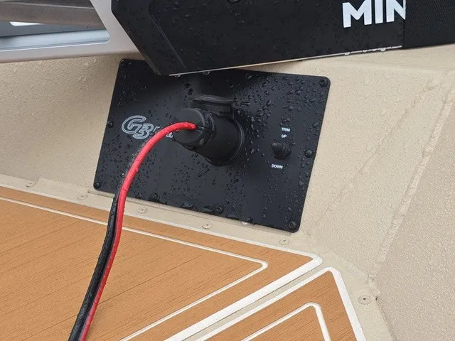 Slide: The Image of Close-up of a charging port on a boat with G3 logo and wet deck. - 29