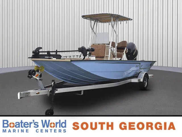 The Image of A 2026 G3 Bay 19 GX boat on a trailer in a showroom. - 1