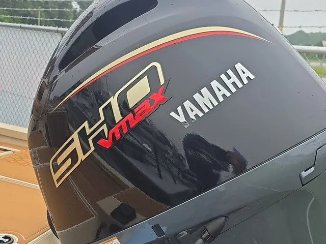 Slide: The Image of Close-up of a Yamaha SHO VMAX outboard motor mounted on a boat. - 18