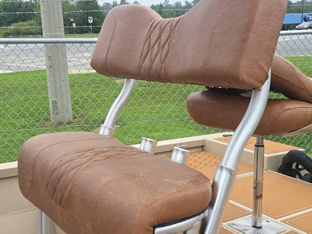 Slide: The Image of Close-up of a brown boat seat with metal frame on a 2026 G3 Bay 19 GX. - 14