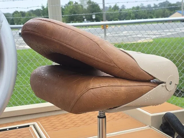 Slide: The Image of A brown, cushioned boat seat with adjustable backrest on a G3 Bay 19 GX. - 17
