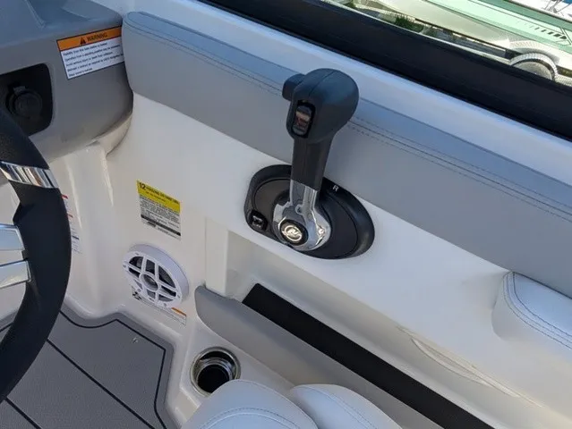 Slide: The Image of Close-up of a Chaparral 21 SSi helm area with throttle lever and speaker. - 26