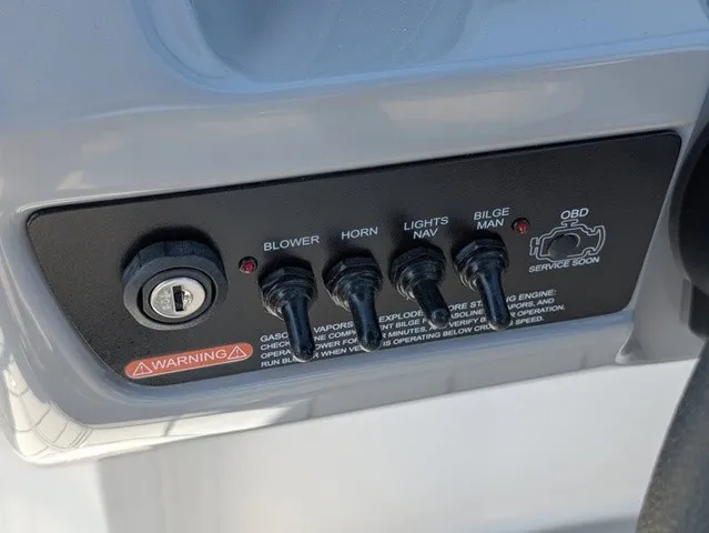 Slide: The Image of Close-up of a control panel with switches for blower, horn, lights, bilge, and more. - 30