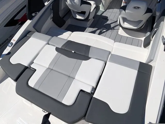 Slide: The Image of The image shows the cockpit of a Chaparral 21 SSi boat with modern seating. - 15