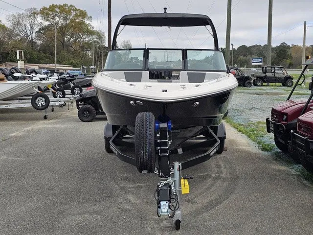 Slide: The Image of A Chaparral 23 SSi boat on a trailer, ready for transport. - 4