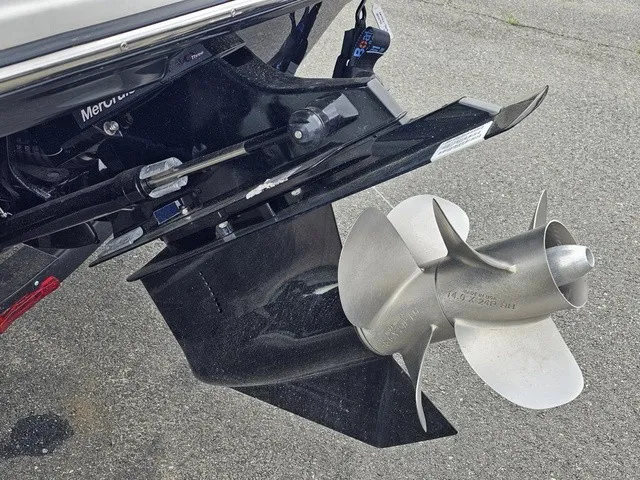Slide: The Image of Close-up of a stainless steel boat propeller on a 2026 Chaparral 23 SSi. - 10