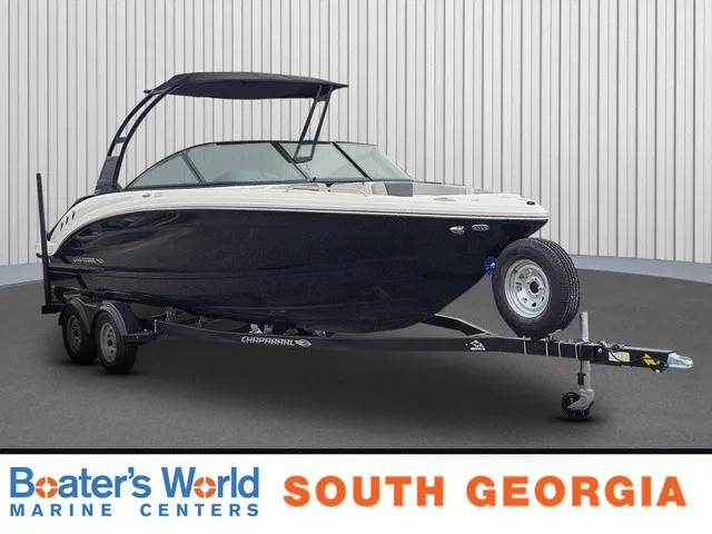 The Image of A 2026 Chaparral 23 SSi boat on a trailer in a showroom. - 1
