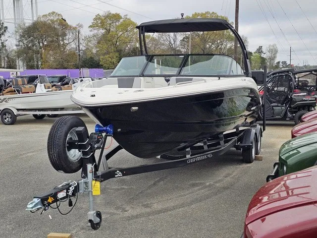 Slide: The Image of A 2026 Chaparral 23 SSi boat on a trailer in an outdoor lot. - 3