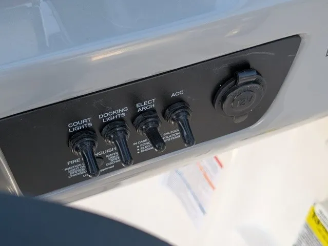 Slide: The Image of Switch panel with labels for lights and accessories. - 23