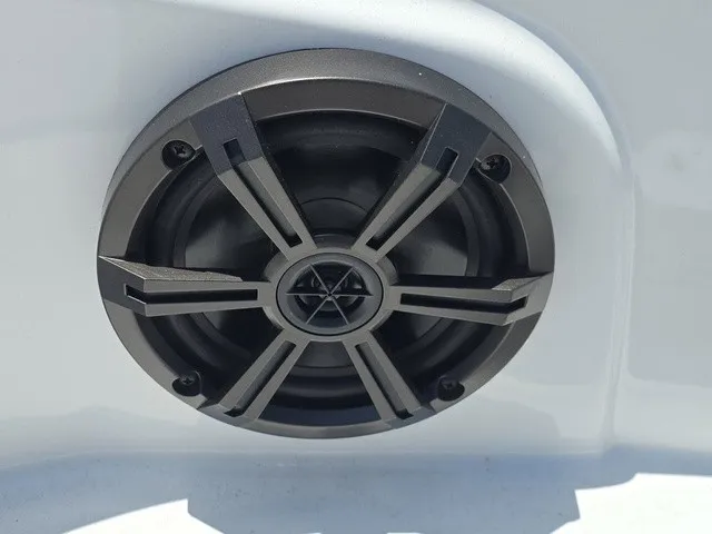 Slide: The Image of Close-up of a speaker in a white boat. - 12