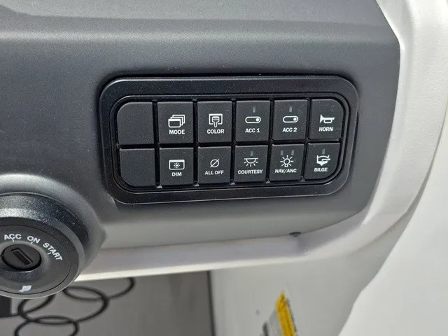 Slide: The Image of Control panel of a 2026 Tahoe T21 with various function buttons. - 23