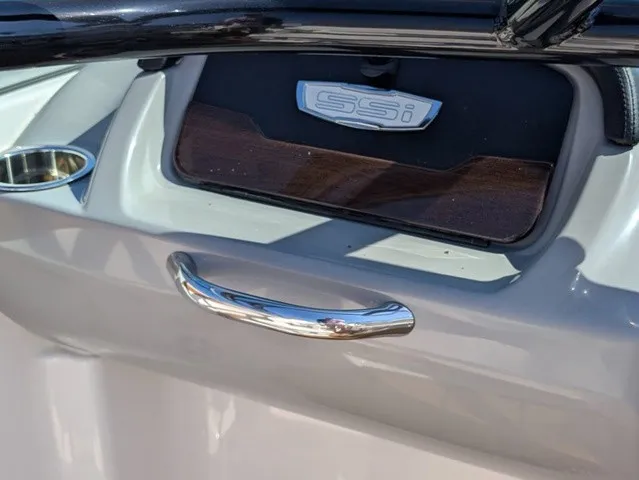 Slide: The Image of Close-up of a Chaparral 21 SSi boat with stainless steel handle and SSI logo. - 29