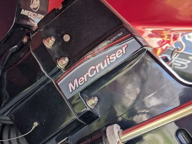 Slide: The Image of Close-up of a MerCruiser engine in a 2023 Chaparral 21 SSi boat. - 13